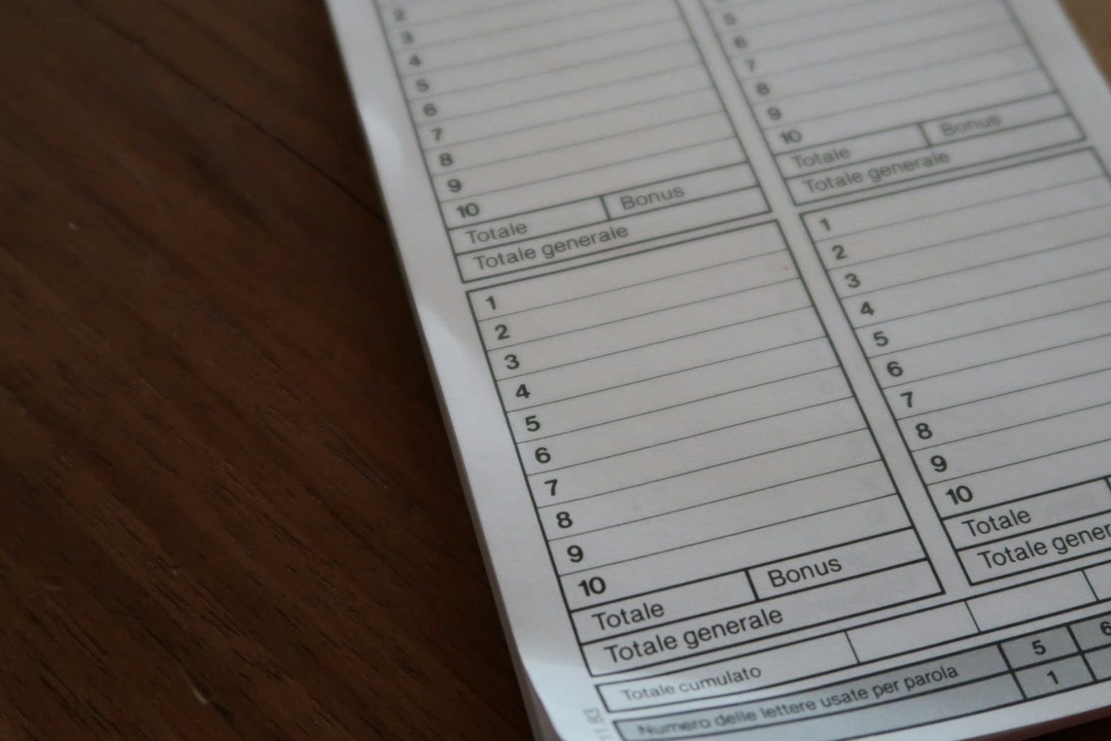 A paper form on a wooden table